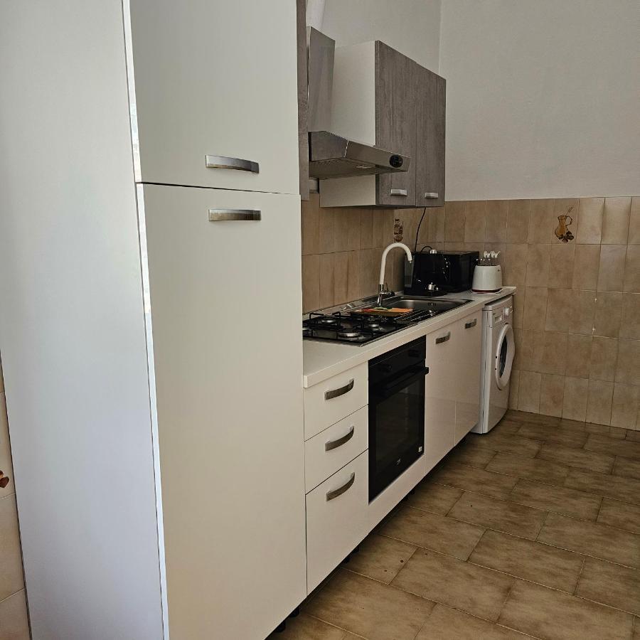 Appartamento A Telti Con Giardino Privato E Posto Auto Exterior photo